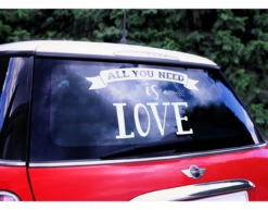 Autosticker All You Need Is Love 45cm -Feestartikelen Winkel autosticker all you need is love 45cm 1